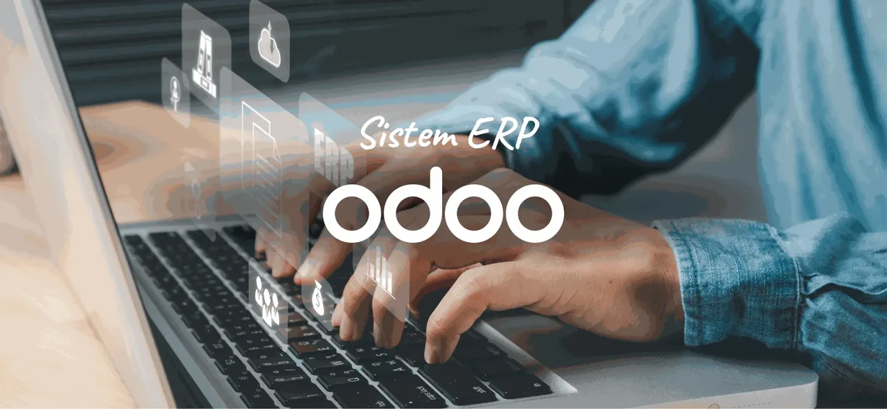 Mengetik di laptop dengan tulisan Sistem ERP Odoo